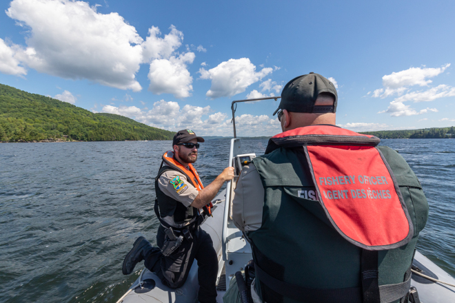 A Fishery Officer meeting a boater