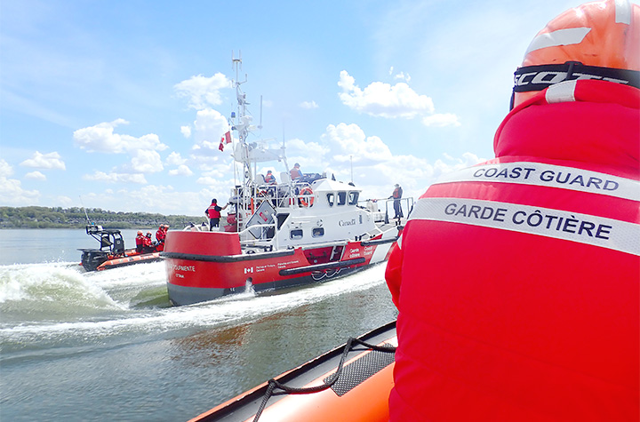Member of the Canadian Coast Guard on a boat