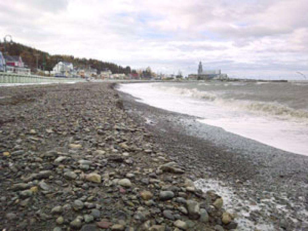 Example of beach nourishment on the shore of a coastal village