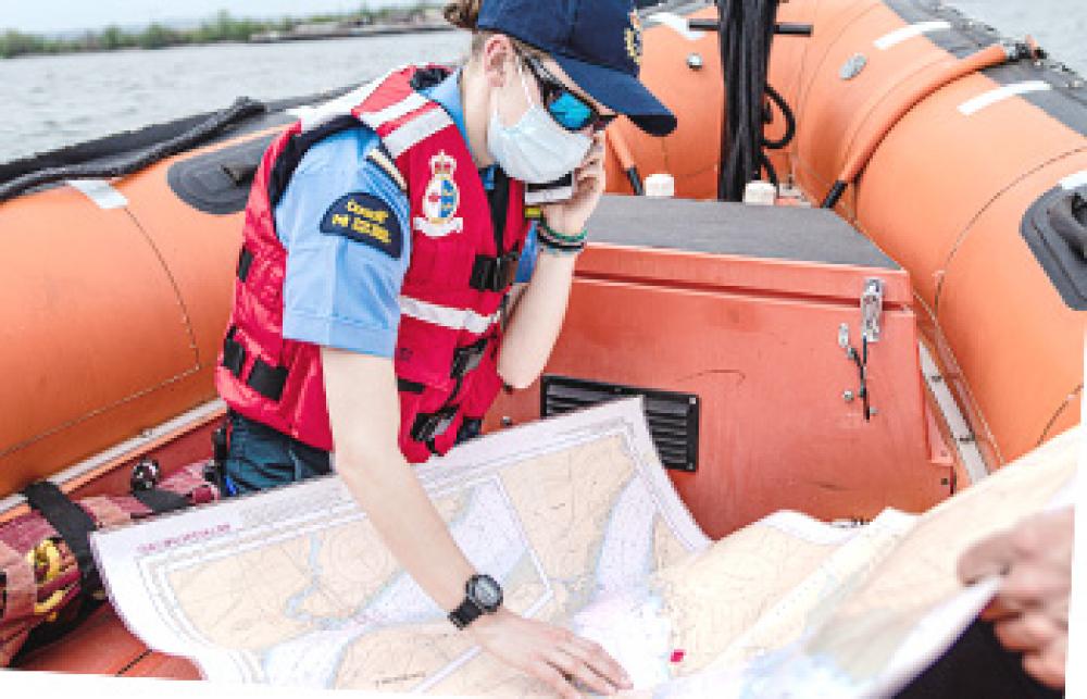 A CCG student looking at a map