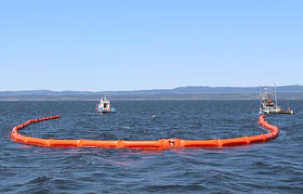 Deploying booms is one means of protecting aquatic species during an oil spill.