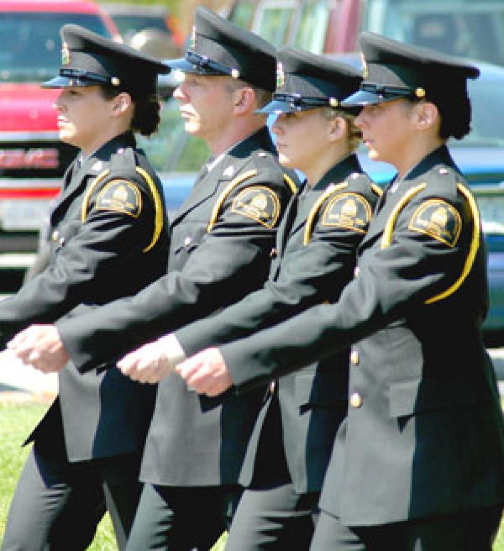 Fisheries officers at a graduation ceremony